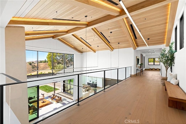 25151 Jim Bridger Rd, Hidden Hills, CA 91302 - hall featuring a wood ceiling with exposed beams, hardwood / wood-style floors, and high vaulted ceiling