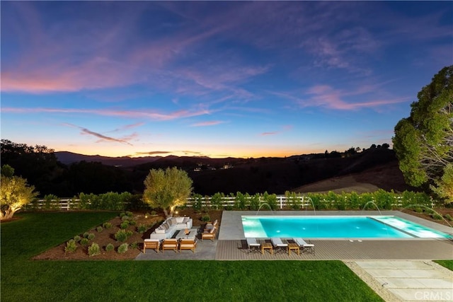 25151 Jim Bridger Rd, Hidden Hills, CA 91302 - swimming pool featuring a patio, a yard, and an outdoor living space