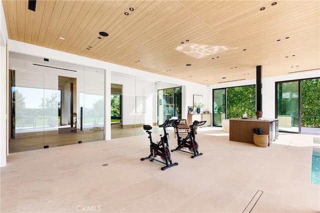 25151 Jim Bridger Rd, Hidden Hills, CA 91302 - interior space with wood ceiling, expansive windows, and light tile patterned flooring