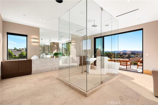 25151 Jim Bridger Rd, Hidden Hills, CA 91302 - full bathroom featuring a shower stall, a bathtub, and a mountain view