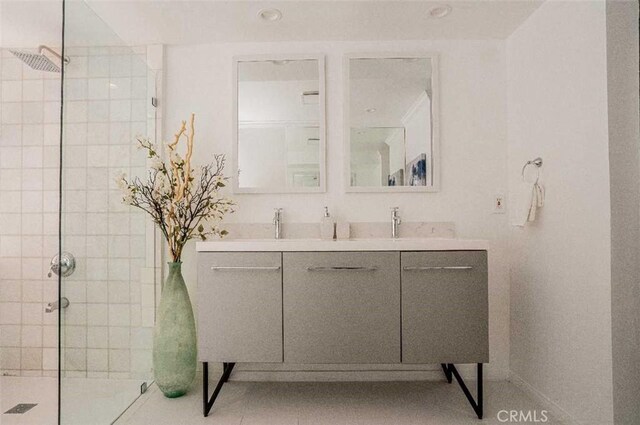 3183 N Laurel Canyon Blvd, Studio City, CA 91604 - bathroom featuring a tile shower, double vanity, and recessed lighting