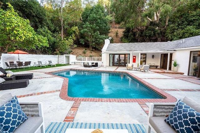 3183 N Laurel Canyon Blvd, Studio City, CA 91604 - view of swimming pool with a patio area, outdoor lounge area, and view of scattered trees