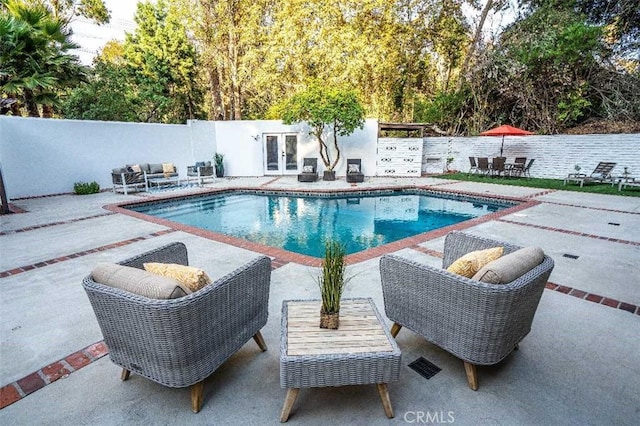 3183 N Laurel Canyon Blvd, Studio City, CA 91604 - view of swimming pool with french doors, a fenced backyard, and a patio