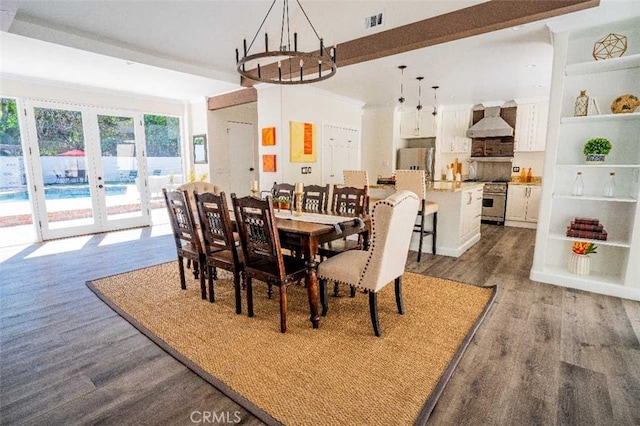 3183 N Laurel Canyon Blvd, Studio City, CA 91604 - dining room with wood finished floors, french doors, and a chandelier
