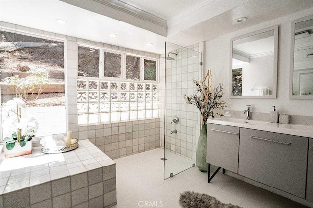3183 N Laurel Canyon Blvd, Studio City, CA 91604 - bathroom featuring ornamental molding, vanity, walk in shower, tile patterned floors, and healthy amount of natural light