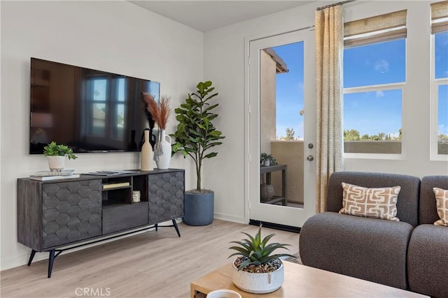 7348 Foster Bridge Blvd, Downey, CA 90240 - living area featuring wood finished floors