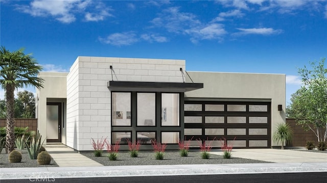 1377 Celadon Way, Palm Springs, CA 92262 - view of front of home with concrete driveway and a garage