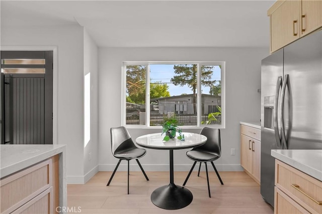 12934 Fenton Ave, Sylmar, CA 91342 - dining room with light wood-style floors and baseboards