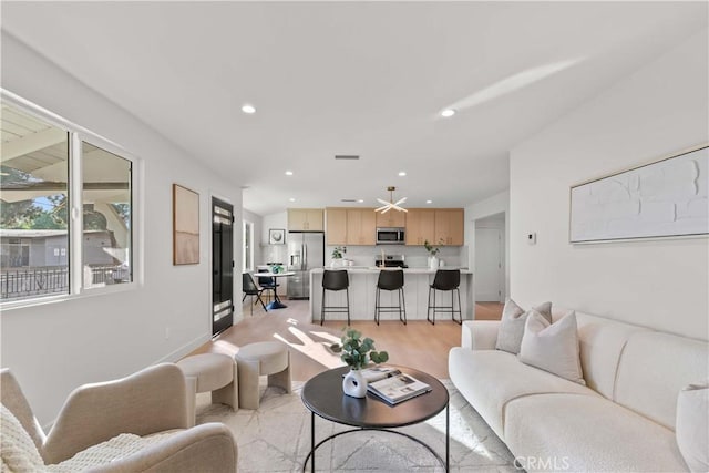 12934 Fenton Ave, Sylmar, CA 91342 - living area with recessed lighting and light wood-type flooring