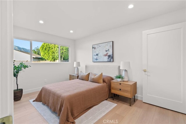12934 Fenton Ave, Sylmar, CA 91342 - bedroom with wood finished floors and recessed lighting