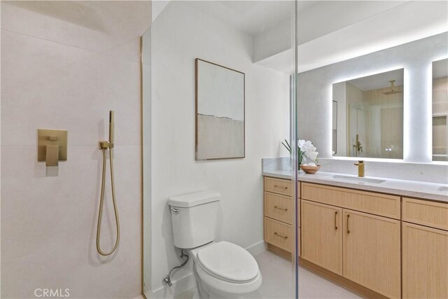 12934 Fenton Ave, Sylmar, CA 91342 - bathroom featuring vanity, a shower, and tile patterned flooring