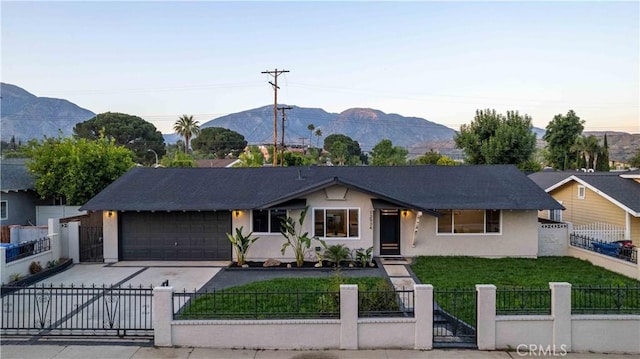 12934 Fenton Ave, Sylmar, CA 91342 - single story home with stucco siding, concrete driveway, an attached garage, and a fenced front yard