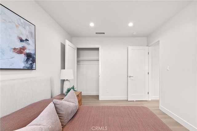12934 Fenton Ave, Sylmar, CA 91342 - bedroom featuring light wood-type flooring, a closet, and recessed lighting