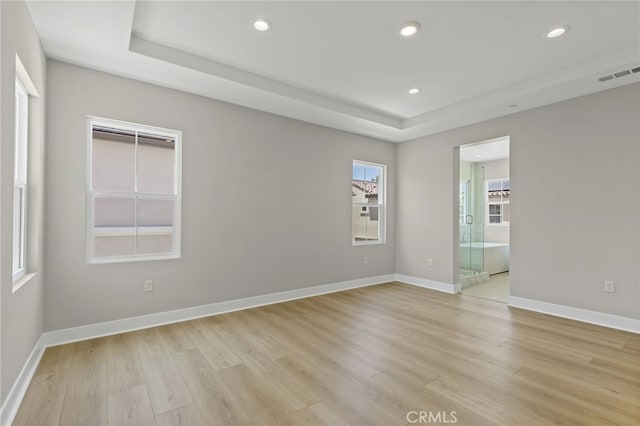 573 Patten Ave, Placentia, CA 92870 - unfurnished room featuring light wood-style floors, a raised ceiling, and recessed lighting