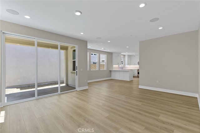573 Patten Ave, Placentia, CA 92870 - unfurnished living room featuring light wood finished floors and recessed lighting