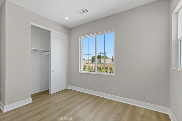 573 Patten Ave, Placentia, CA 92870 - unfurnished bedroom featuring light wood-type flooring, a closet, and recessed lighting