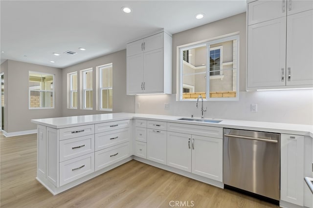 573 Patten Ave, Placentia, CA 92870 - kitchen featuring dishwasher, a peninsula, light countertops, white cabinetry, and recessed lighting