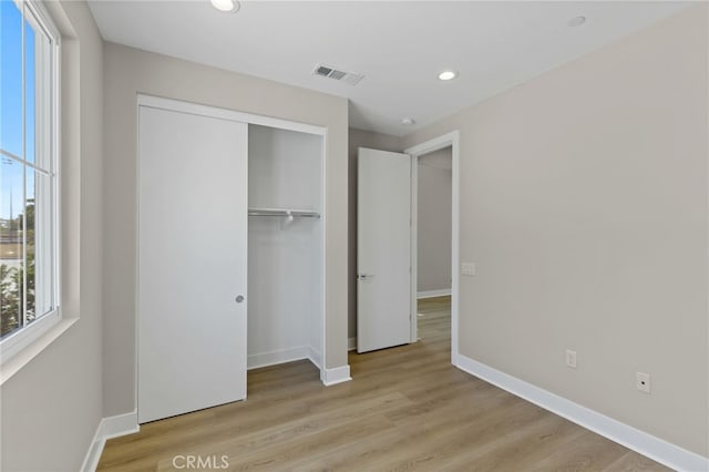573 Patten Ave, Placentia, CA 92870 - unfurnished bedroom with wood finished floors, a closet, and recessed lighting