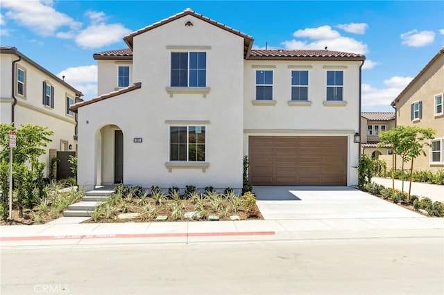573 Patten Ave, Placentia, CA 92870 - mediterranean / spanish-style home featuring a tile roof, stucco siding, and driveway