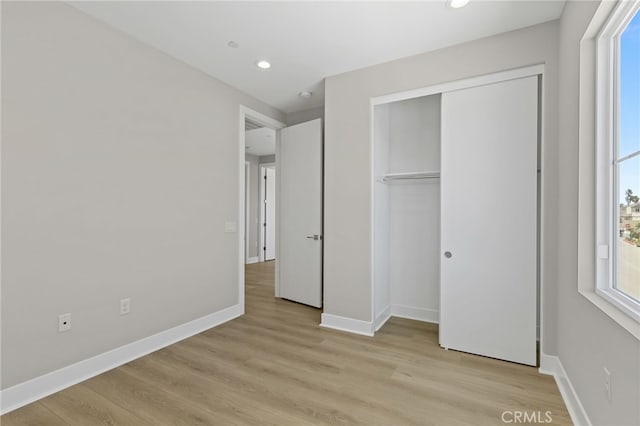 573 Patten Ave, Placentia, CA 92870 - unfurnished bedroom with light wood-style floors, recessed lighting, and a closet
