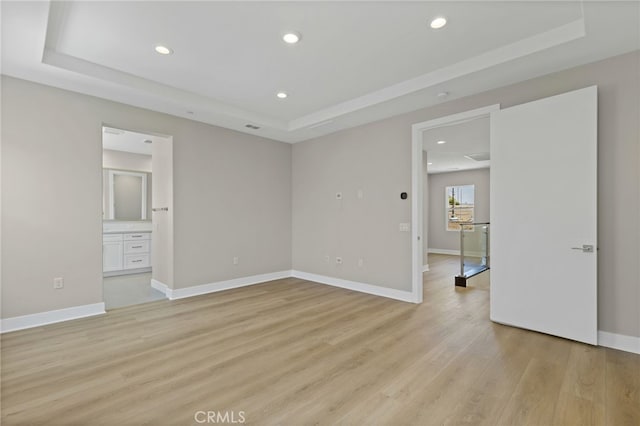 573 Patten Ave, Placentia, CA 92870 - empty room with a raised ceiling, light wood-type flooring, and recessed lighting