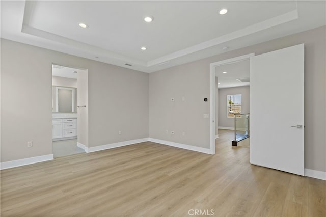 573 Patten Ave, Placentia, CA 92870 - unfurnished room featuring a raised ceiling, light wood-type flooring, and recessed lighting