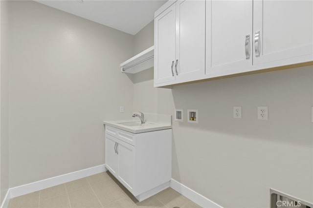 573 Patten Ave, Placentia, CA 92870 - laundry area with washer hookup, cabinet space, and light tile patterned floors