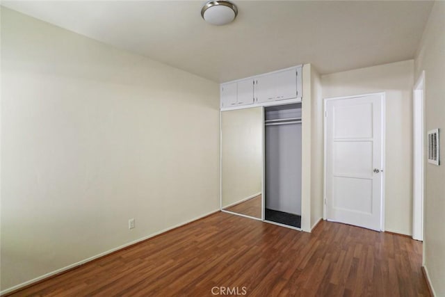 343 Concord St, Glendale, CA 91203 - unfurnished bedroom featuring dark wood finished floors and a closet