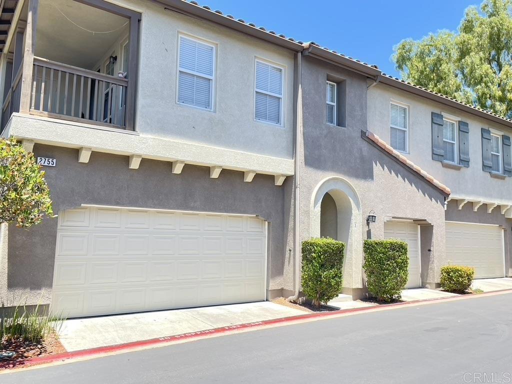 2755 Castlehill Rd Unit 1, Chula Vista, CA 91915 - multi unit property with a garage and stucco siding