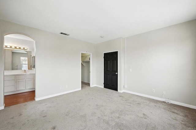 2755 Castlehill Rd Unit 1, Chula Vista, CA 91915 - unfurnished bedroom with carpet, a spacious closet, ensuite bathroom, and a closet