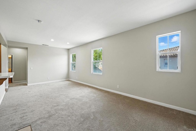 2755 Castlehill Rd Unit 1, Chula Vista, CA 91915 - empty room featuring light colored carpet, recessed lighting, and a smoke detector