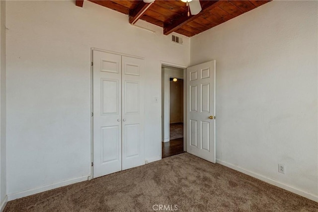 4523 Columbia Ave, Riverside, CA 92501 - unfurnished bedroom with a wooden ceiling with exposed beams, carpet, and a closet