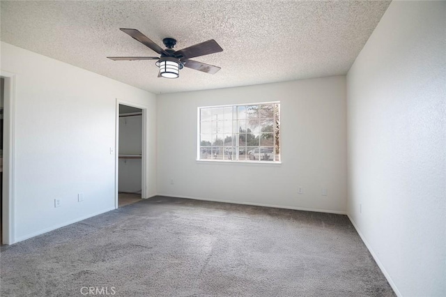 9018 Buckthorn Ave, Hesperia, CA 92345 - unfurnished bedroom with carpet flooring, a textured ceiling, a ceiling fan, and a closet