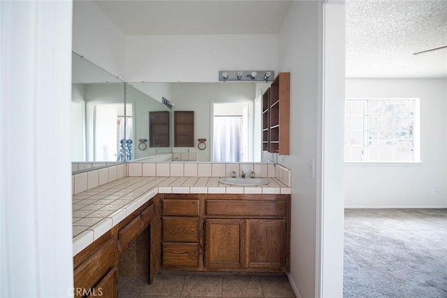 9018 Buckthorn Ave, Hesperia, CA 92345 - bathroom with plenty of natural light and vanity