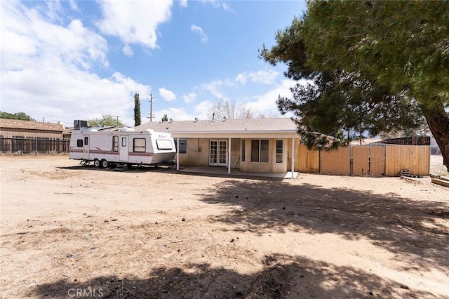 9018 Buckthorn Ave, Hesperia, CA 92345 - rear view of house with french doors