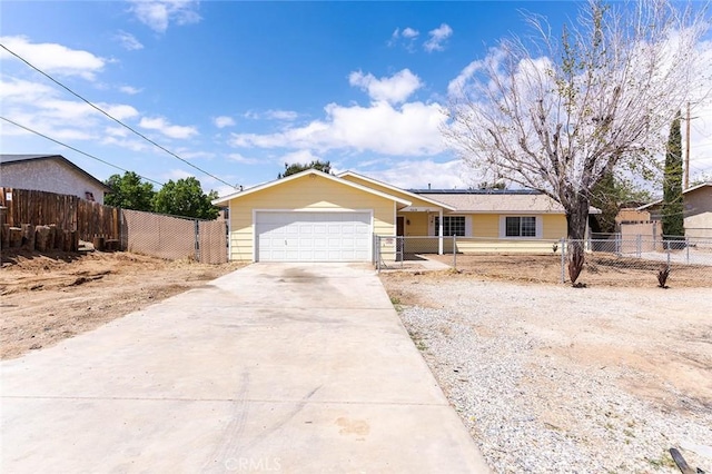9018 Buckthorn Ave, Hesperia, CA 92345 - single story home featuring driveway, solar panels, and a garage