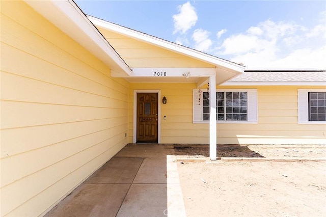 9018 Buckthorn Ave, Hesperia, CA 92345 - entrance to property featuring a shingled roof