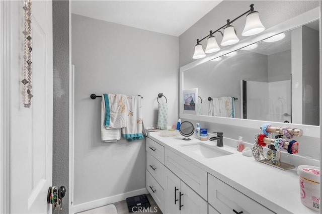 31319 The Old Rd Unit A, Castaic, CA 91384 - bathroom featuring vanity and baseboards