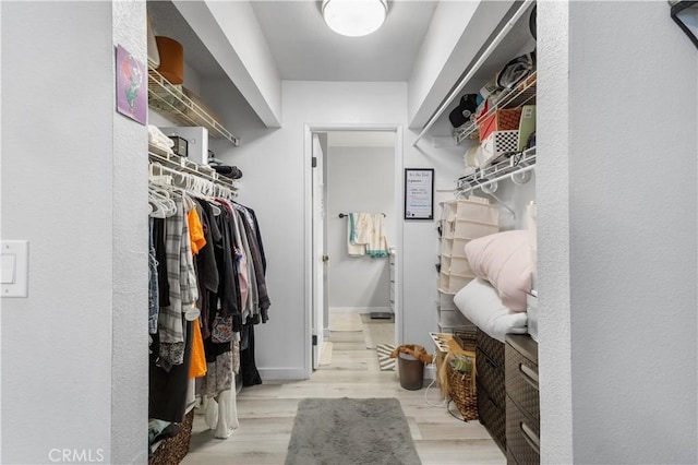 31319 The Old Rd Unit A, Castaic, CA 91384 - walk in closet with wood finished floors