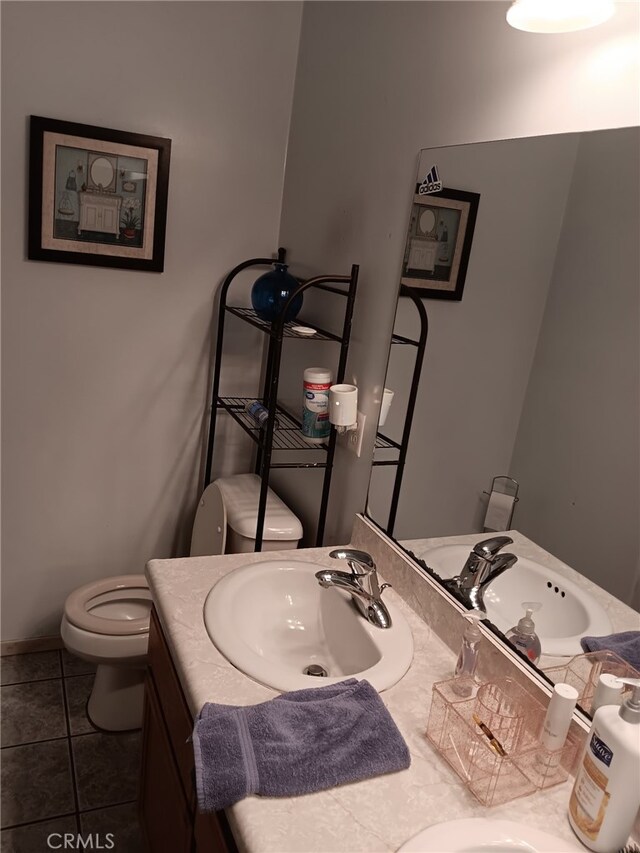 412 Leeta St, Bakersfield, CA 93307 - bathroom with vanity and tile patterned flooring