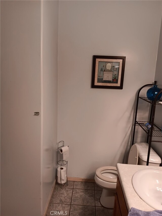 412 Leeta St, Bakersfield, CA 93307 - bathroom with vanity and tile patterned flooring