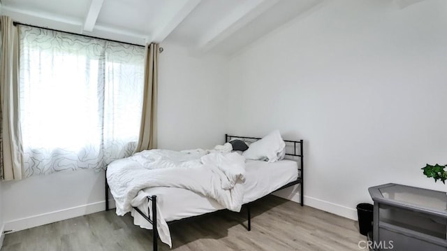 10361 Perdido St, Anaheim, CA 92804 - bedroom featuring beamed ceiling and wood finished floors