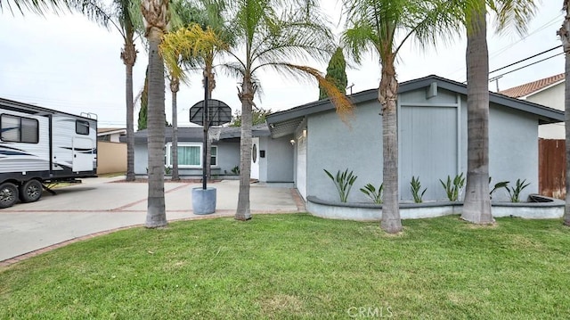 10361 Perdido St, Anaheim, CA 92804 - view of front of home with stucco siding and a front yard