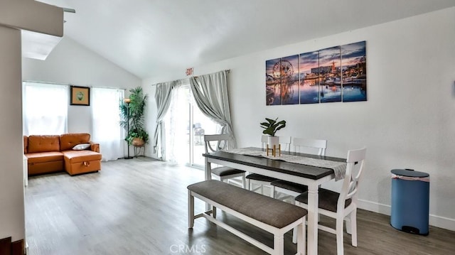 10361 Perdido St, Anaheim, CA 92804 - dining area with wood finished floors and lofted ceiling