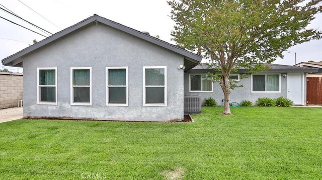 10361 Perdido St, Anaheim, CA 92804 - rear view of house featuring stucco siding