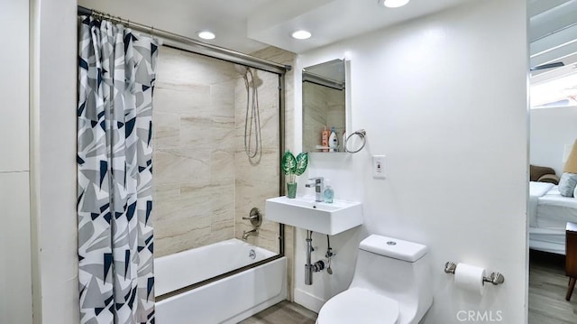 10361 Perdido St, Anaheim, CA 92804 - full bath with shower / bath combo with shower curtain, recessed lighting, and wood finished floors