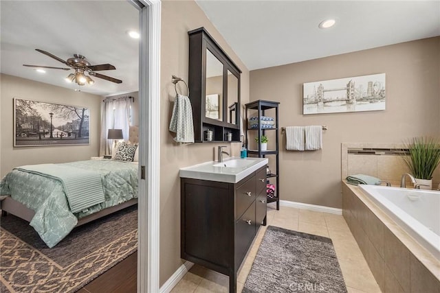 15503 Fernview St, Whittier, CA 90604 - bathroom featuring vanity, a bath, a ceiling fan, ensuite bath, and tile patterned floors