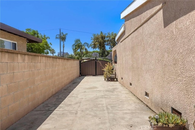 15503 Fernview St, Whittier, CA 90604 - view of patio featuring a gate