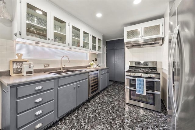 15503 Fernview St, Whittier, CA 90604 - kitchen with appliances with stainless steel finishes, beverage cooler, gray cabinets, backsplash, and recessed lighting