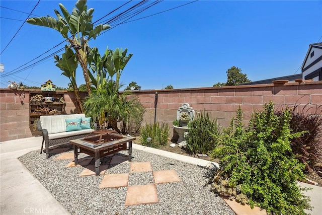 15503 Fernview St, Whittier, CA 90604 - fenced backyard with a patio and an outdoor living space with a fire pit